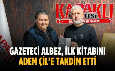 Gazeteci Albez, ilk kitabını Adem Çil’e takdim etti