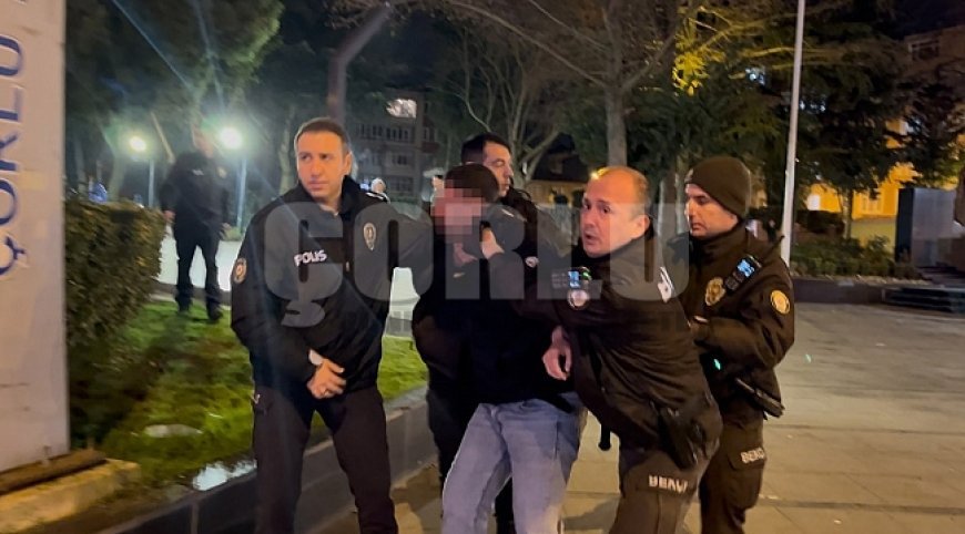 Tartıştığı gencin başında içki şişesini kırdı