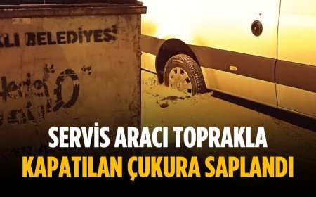 Servis aracı toprakla kapatılan çukura saplandı