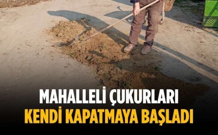 Mahalleli çukurları kendi kapatmaya başladı