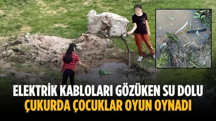 Elektrik kabloları gözüken su dolu çukurda çocuklar oyun oynadı